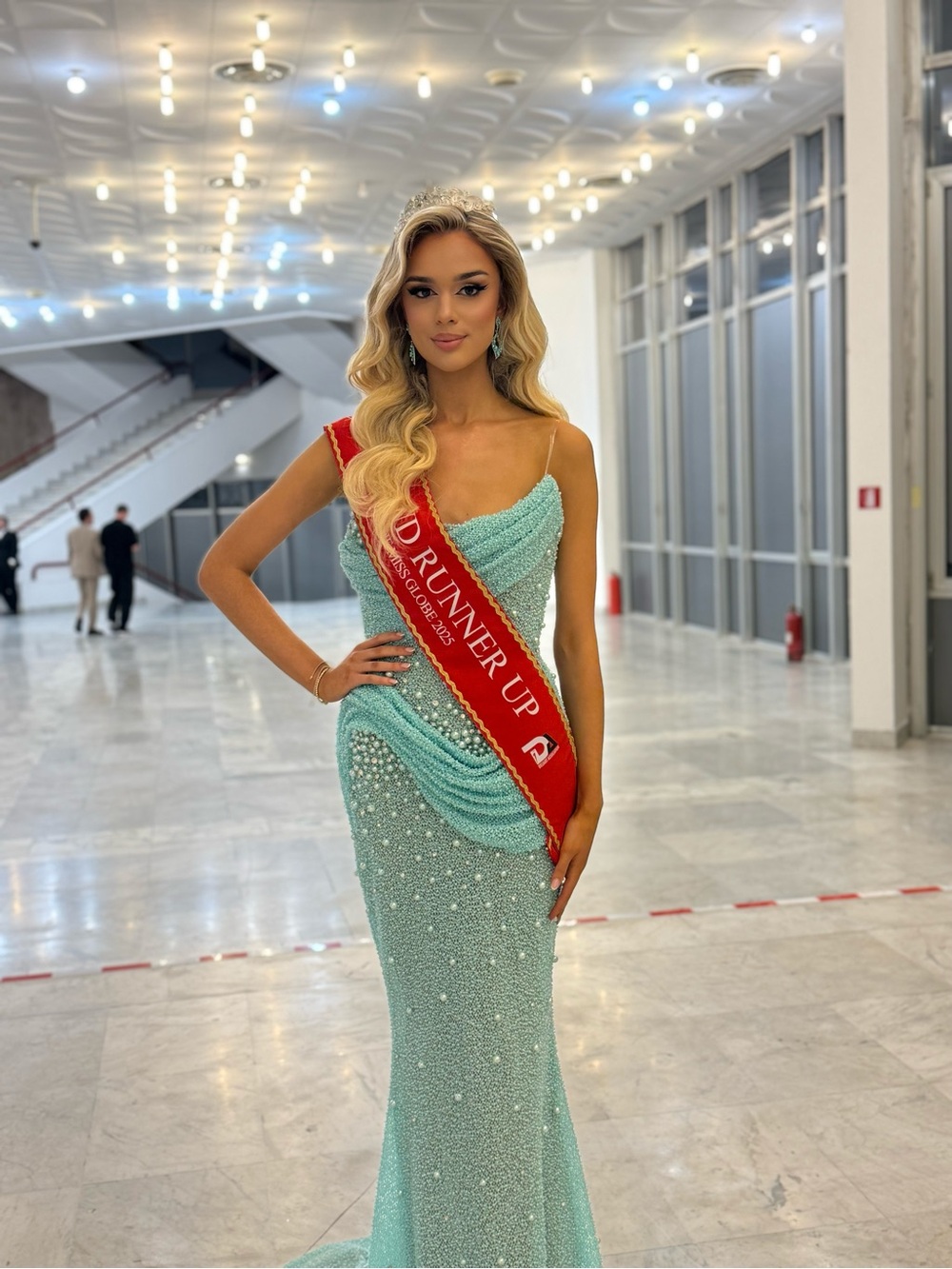 Elegant Aqua Beaded Evening Gown with Draped Detail